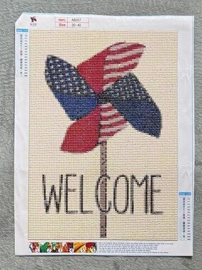 Finished Welcome Pinwheel Diamond Painting Wall Accent in Red, Blue and Cream